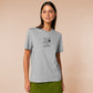 An embroidered light grey t-shirt design of the Australian Jack Karlson being arrested while he shouts Eating A Meal? A Succulent Chinese Meal?!