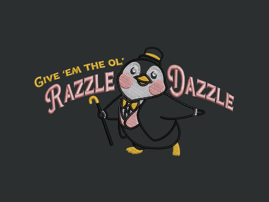 A grey crew neck short sleeve t-shirt, with an embroidered penguin in a fancy suit and top hat and the quote Give 'em the ol' Razzle Dazzle.