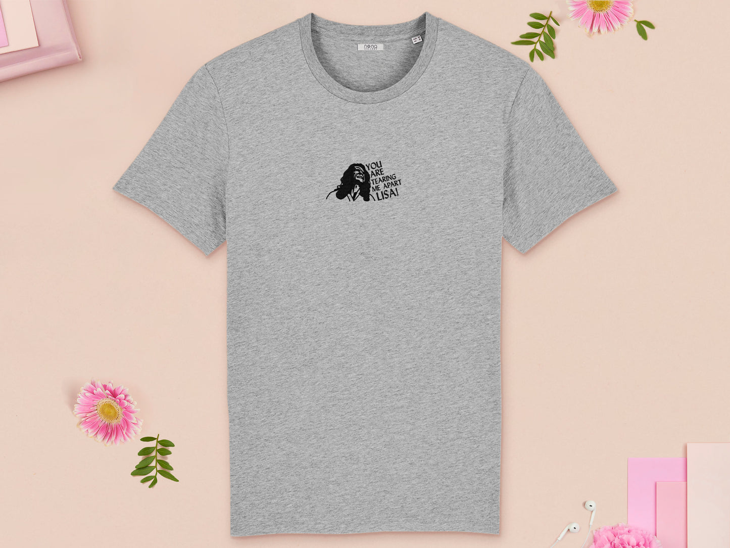 A short sleeved grey t-shirt with an embroidered black design of Tommy Wiseau in the movie The Room with the quote You Are Tearing Me Apart Lisa!