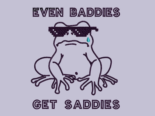 Embroidered lavender purple design of a frog in thug life sunglasses crying with a single tear and the words Even Baddies Get Saddies