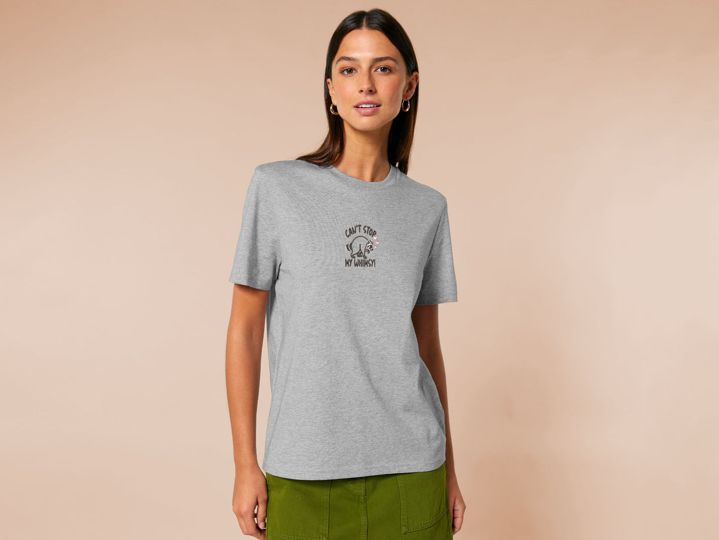 An Embroidered light grey t-shirt design of a cute Jimothy the viral disabled raccoon and the quote can't stop my whimsy!