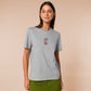 An Embroidered light grey t-shirt design of a cute chib french snail with the quote sacreblu!