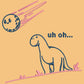 A yellow top with a blue and pink embroidered design of a cute smiling dinosaur looking at a meteor plummeting to earth with the text uh oh...