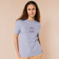 Purple embroidered tshirt with a cute design of a chibi owlbear crying holding a d20 dice that has rolled a one with the quote Crying Is A Free Action