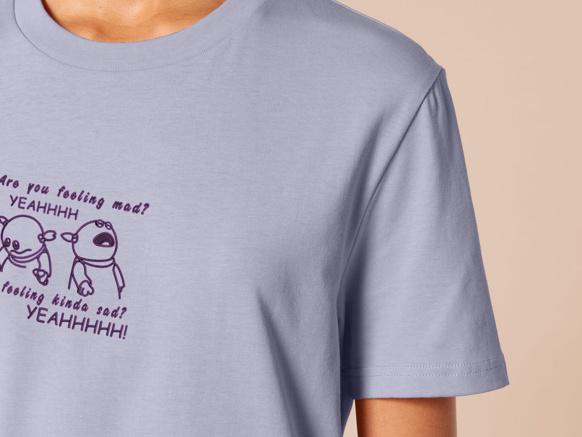 Embroidered purple t-shirt design of the character Mona from the puppet show Nanalan in two angry poses from the viral tiktok meme with the text You feeling mad? Yeah. You Feeling Kinda Sad? YEAHHHH!