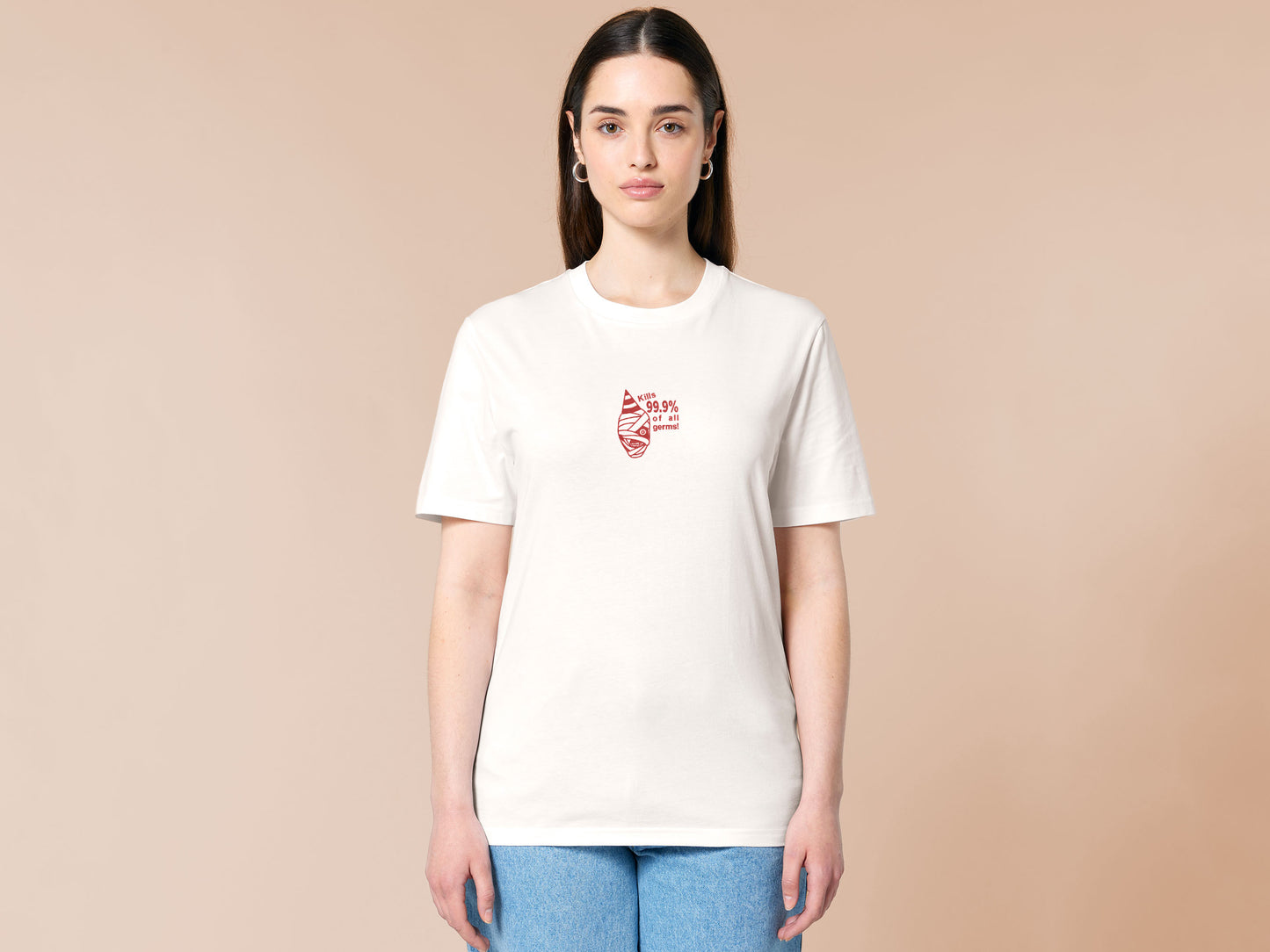 White t-shirt with a red embroidered design of the face of captain Curly from the indie horror game Mouthwashing wearing a party hat and the quote kills 99.9% of al germs!