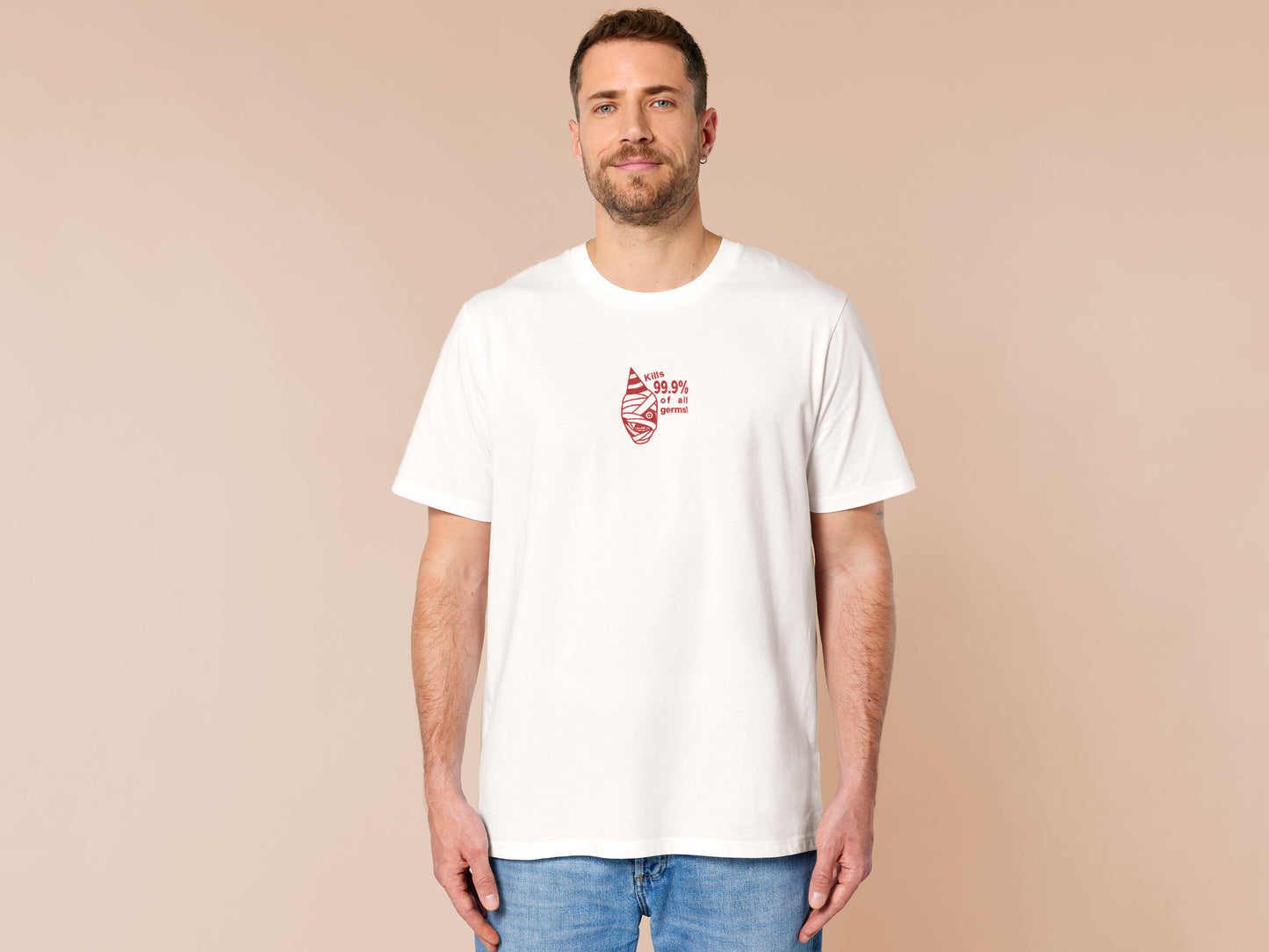 White t-shirt with a red embroidered design of the face of captain Curly from the indie horror game Mouthwashing wearing a party hat and the quote kills 99.9% of al germs!