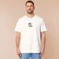 An embroidered white t-shirt design of a blood drenched meeple holding a knife with text When I Play Board Games I Have No Friends