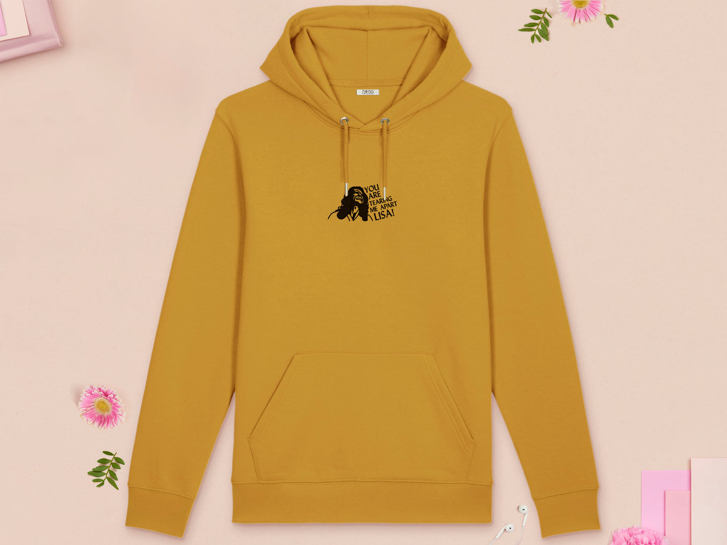 A long sleeved yellow fleece hoodie with an embroidered black design of Tommy Wiseau in the movie The Room with the quote You Are Tearing Me Apart Lisa!