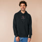 Embroidered black hoodie with a cute chibi cryptid design of Mothman with the text I believe in Mothman (and Mothman believes in me!)
