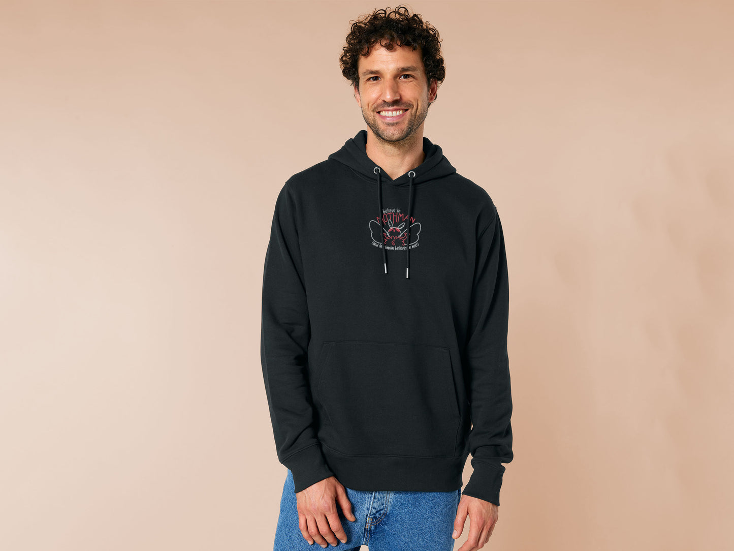 Embroidered black hoodie with a cute chibi cryptid design of Mothman with the text I believe in Mothman (and Mothman believes in me!)