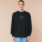 Embroidered black sweater with a cute chibi cryptid design of Mothman with the text I believe in Mothman (and Mothman believes in me!)