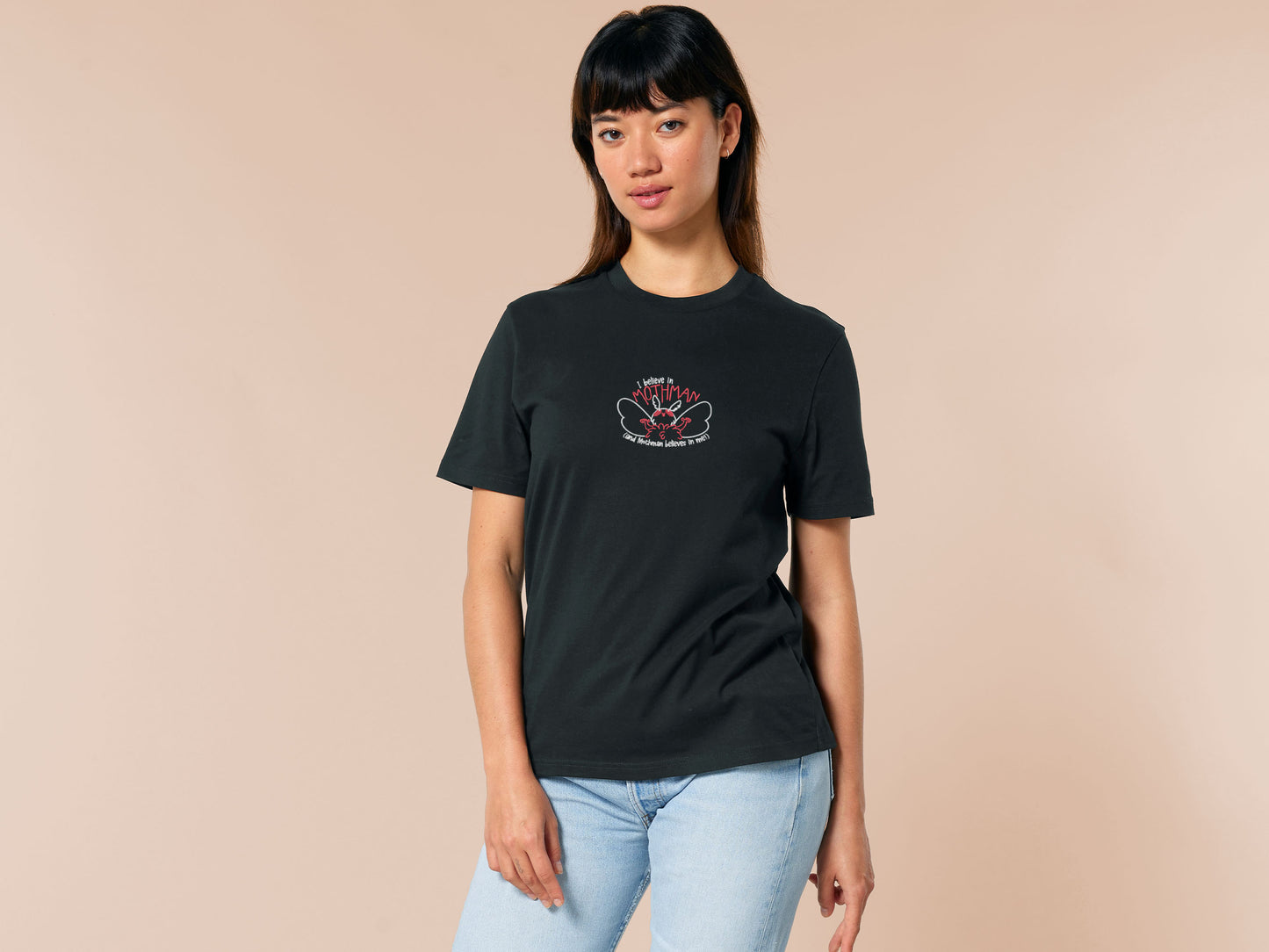 Embroidered black t-shirt with a cute chibi cryptid design of Mothman with the text I believe in Mothman (and Mothman believes in me!)