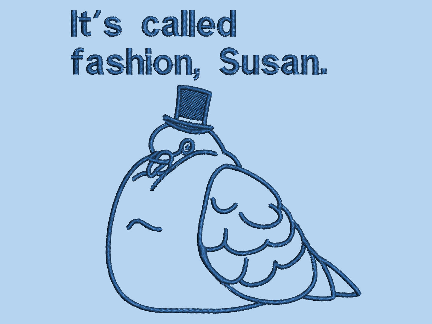 An embroidered blue tshirt design of a fat pigeon wearing a top hat and the text It's Called Fashion Susan