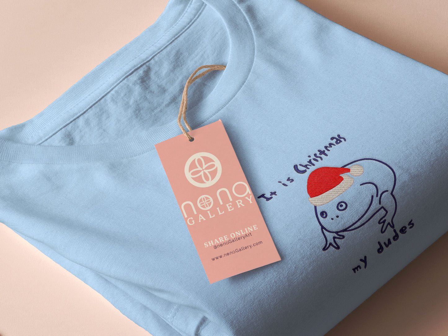 Blue Christmas jumper with an embroidered design of the viral frog Reddit meme it is Wednesday my dudes, but instead it says it is Christmas my dudes and the frog is wearing a red Christmas hat.