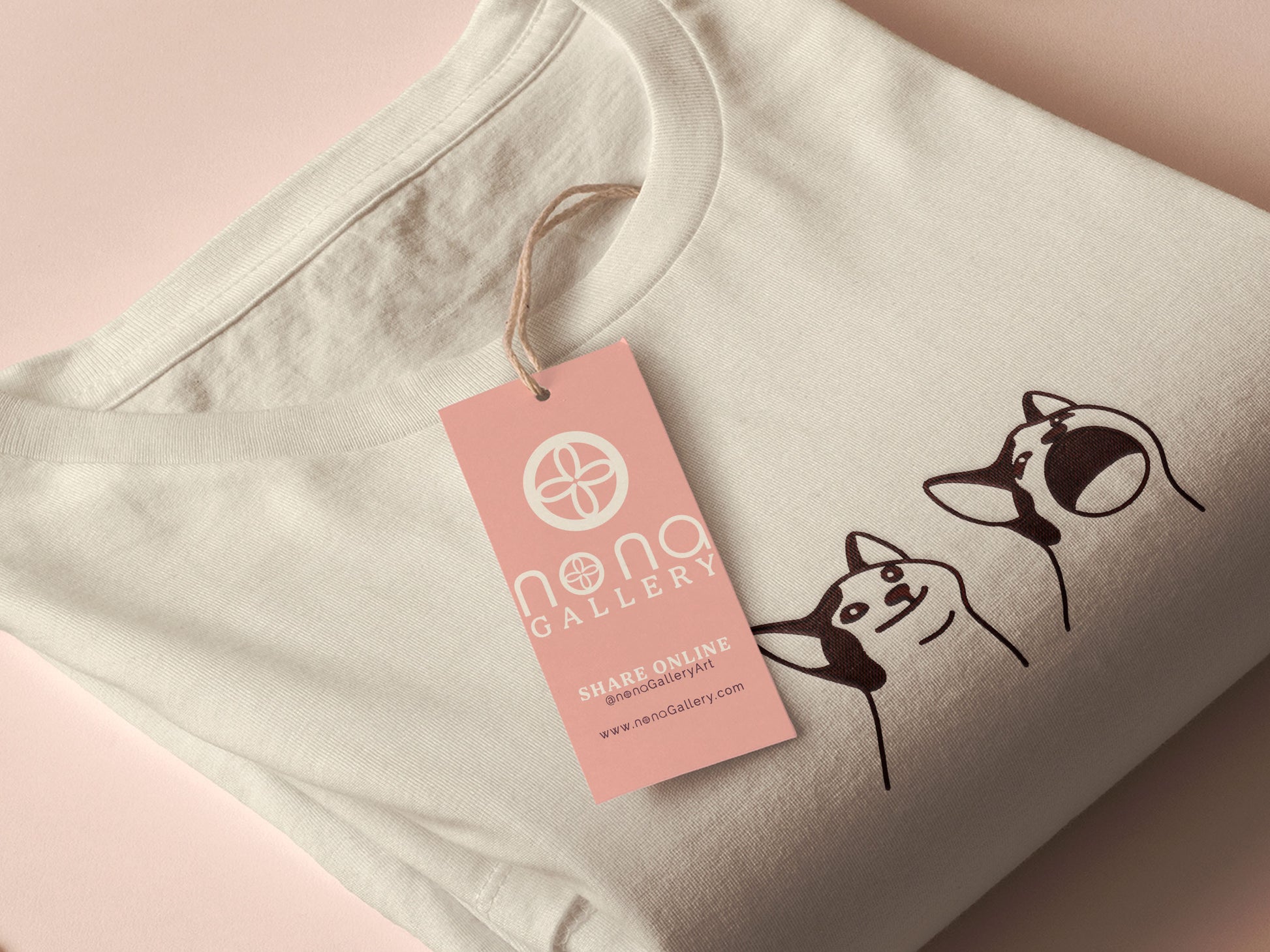 A cream crew neck short sleeve t-shirt, with an embroidered brown thread design of a cute popcat the cat meme reaction twitch emote