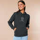 An embroidered dark grey hoodie with a cute chibi bunny and the text Woke Up And Chose Violence.