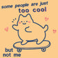 Light yellow short sleeve t-shirt with embroidered pink and blue design of a cute chibi skateboarding cat with the text some people are just too cool but not me.