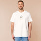 An embroidered white t-shirt design of a cute cartoon goose wearing a paper hat with text underneath that reads you silly goose.