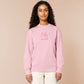 A pink crew neck long sleeve sweater, with an embroidered pink thread design of a cute fat cat portrait with text underneath saying (Heavy Breathing)