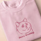 A pink crew neck short sleeve t-shirt, with an embroidered pink thread design of a cute fat cat portrait with text underneath saying (Heavy Breathing)