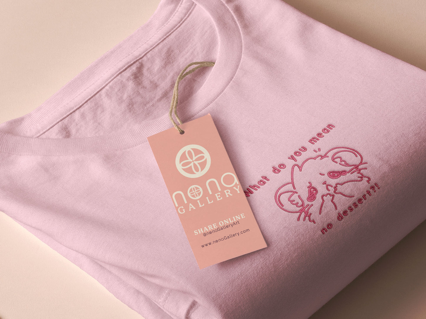 T-shirt with an embroidered Pink Design of a crying chibi hamster with the text what do you mean no dessert?!