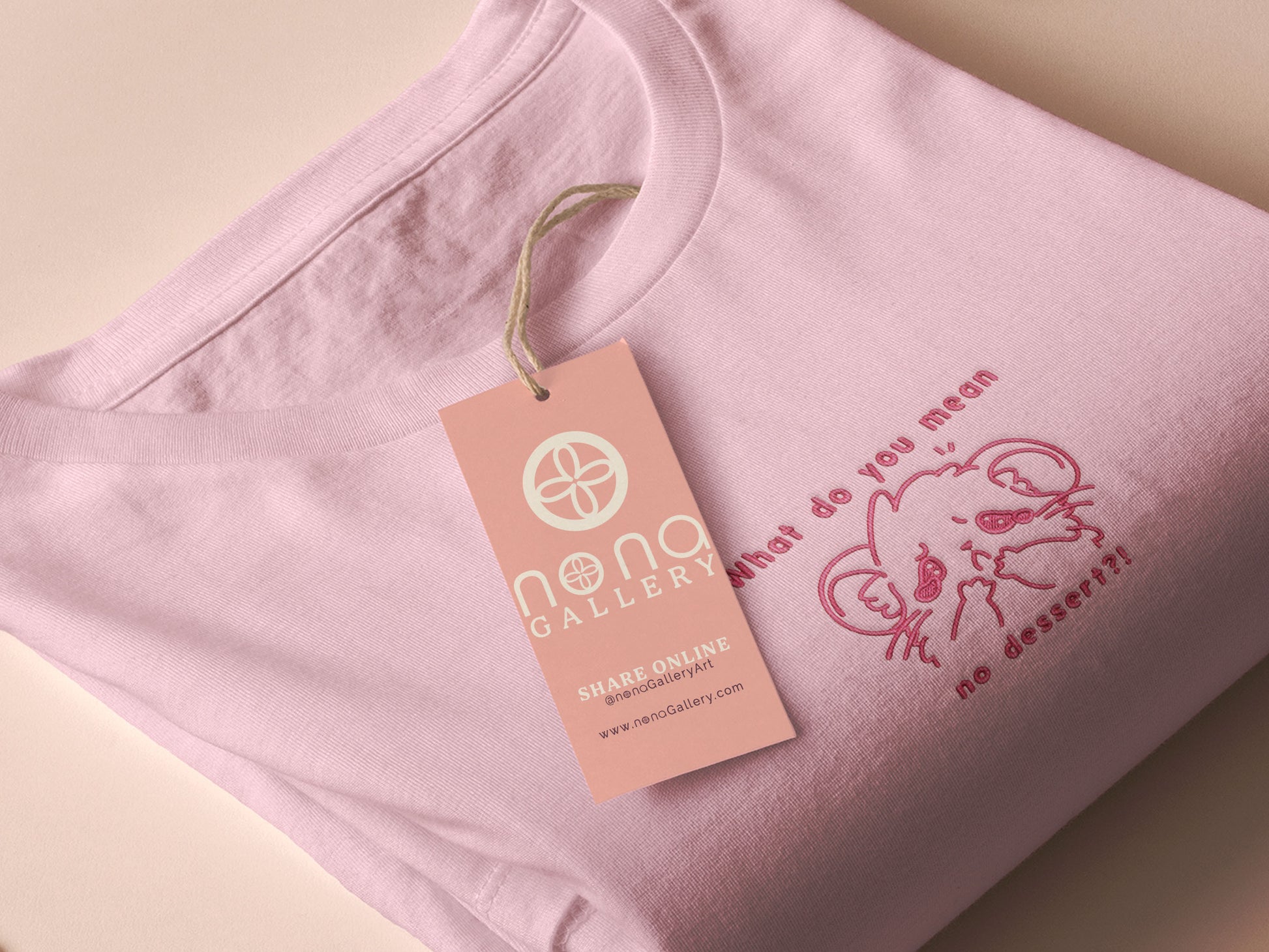 T-shirt with an embroidered Pink Design of a crying chibi hamster with the text what do you mean no dessert?!