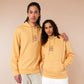 Yellow hoodie with an embroidered mouse sleeping under a patchwork blanket with the text can't mistakey if not awakey