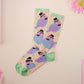 Cute knitted cotton crew socks with a cute pigoens in top hats and bow ties design.
