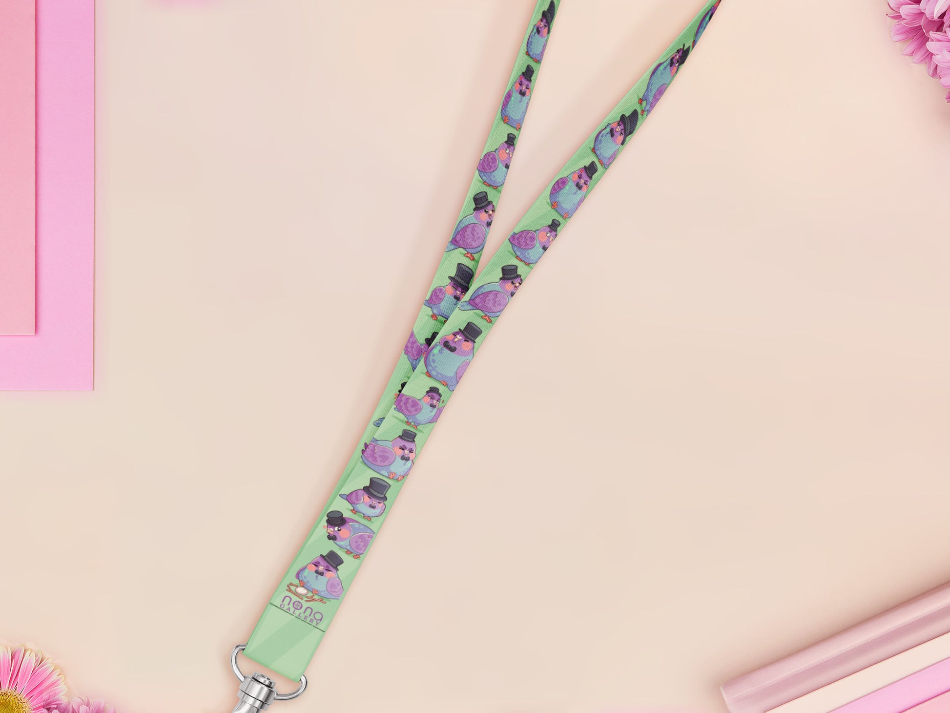 Cute full legth lanyard with a double sided fancy bird pigeon pattern and silver swivel hook clasp.