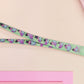 Cute full legth lanyard with a double sided fancy bird pigeon pattern and silver swivel hook clasp.