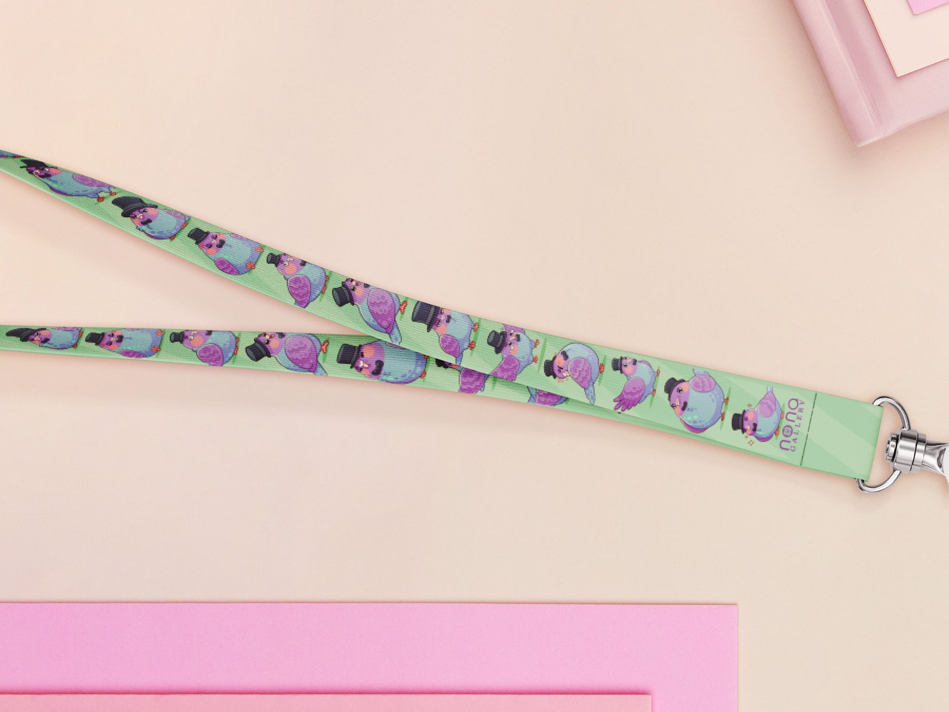 Cute full legth lanyard with a double sided fancy bird pigeon pattern and silver swivel hook clasp.
