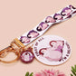 Acrylic epoxy baby penguin keychain with a large acrylic charm of two baby penguins with the quote first of all I'm a delight, a smaller charm of a cute penguin and a matching baby emperor penguin lanyard.