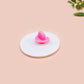 A clear acrylic pin badge with a pink heart-shaped pin back clasp. The design of the pin badge is of a cute baby penguin chicks squabbling with the quote first of all I'm a delight.