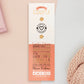 The back of the long white and red backing card with gold accents. The backing card details the symbolism of the different design elements of the couple's Talisman pin. Also shown is the two gold locking pin backs attached to the card.