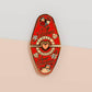Gold Enamel Talisman Pin with red design and the words Couple's Talisman, Always & Forever. The pins design includes a hearts, ducks, as well as flowers and crystals.