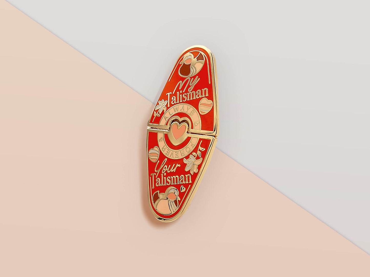 Gold Enamel Talisman Pin with red design and the words Couple's Talisman, Always & Forever. The pins design includes a hearts, ducks, as well as flowers and crystals.