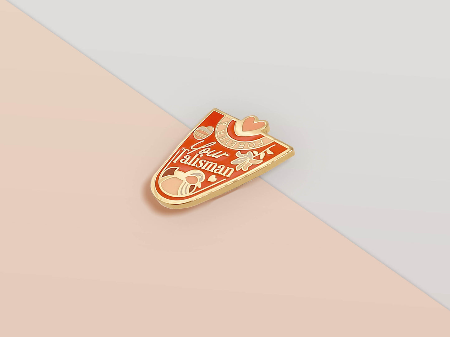 Bottom part of the Gold Enamel Talisman Pin with red design and the words Couple's Talisman, Always & Forever. The pins design includes a hearts, ducks, as well as flowers and crystals.
