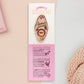 Gold Enamel Talisman Pin with white design and the words Student's Talisman sits on a long white and pink backing card with gold accents. The backing card has details the symbolism of the different design elements of the Talisman pin.