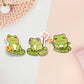 A pastel coloured gloss vinyl stickers of multiple cute frogs and lily pad