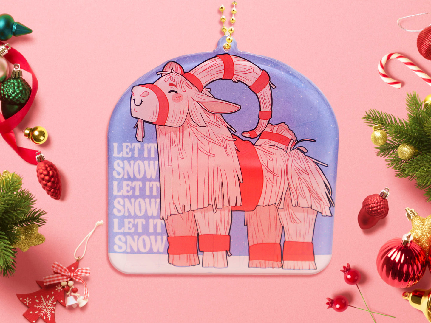 Acrylic epoxy christmas tree hanging decoration with a large acrylic charm of a cute gavle straw goat in the snow with the quote let it snow let it snow let it snow