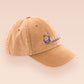 A vintage yellow baseball cap hat with an embroidered cute chicken bird wearing a #1 sports jersey and holding a flag with the quote Go Local Sports Team