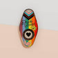 Gold Enamel Talisman Pin with progress pride flag design and the words Pride Talisman, Freedom Equality Visibility. The pins design includes a heart, flowers and crystals.