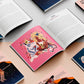 Various copies of the horoscope witches book open on different pages showing different types of witches such as leo the lava witch and their tiger familiar.
