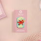 A clear acrylic pin badge with a pink heart-shaped pin back clasp. The design of the pin badge is of a cute chibi retro astronaut floating in sapce with the quote Houston I have so many problems