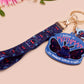 Acrylic epoxy Mothman Cryptid keychain with a large acrylic charm of a cute Mothman with the quote I believe in Mothman and Mothman belives in me, a smaller charm of a cute chibi Mothman and a matching Mothman lanyard.