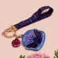 Acrylic epoxy Mothman Cryptid keychain with a large acrylic charm of a cute Mothman with the quote I believe in Mothman and Mothman belives in me, a smaller charm of a cute chibi Mothman and a matching Mothman lanyard.