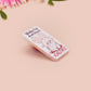 Clear acrylic pin badge with pink heart-shaped rubber pin back clasp. The design of the pin badge is a cute cartoon chibi white rabbit with the quote Woke Up And Chose Violence.