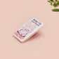 Clear acrylic pin badge with pink heart-shaped rubber pin back clasp. The design of the pin badge is a cute cartoon chibi white rabbit with the quote Woke Up And Chose Violence.