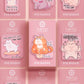 Clear acrylic pin badge with pin heart-shaped pin back clasp. The design of the pin badge is a cute cartoon ginger cat sat in a small cardboard box with the quote if I fits I sits.